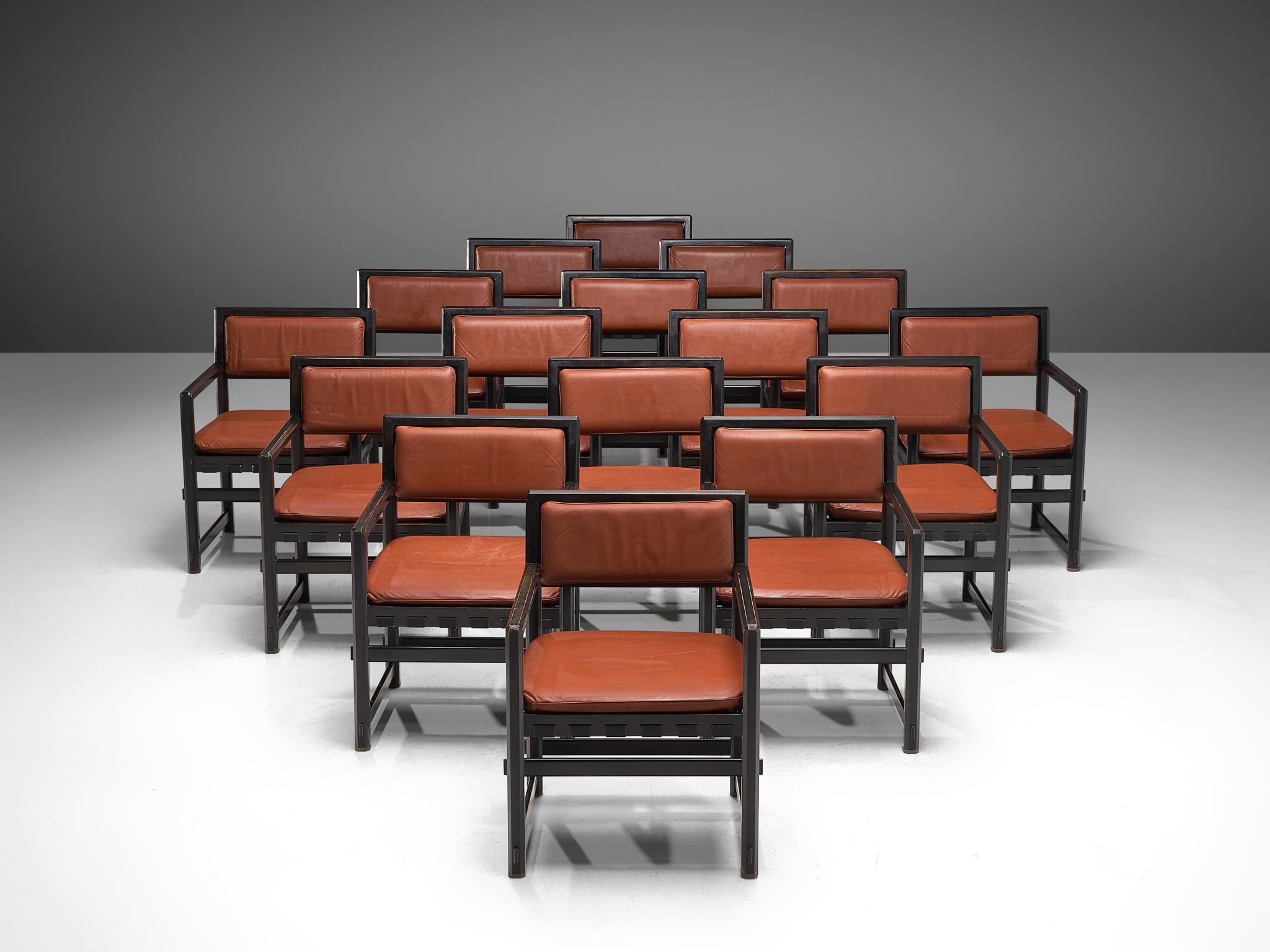 Edward Wormley for Dunbar by Mobilier Universel, armchairs model '5762', lacquered black wood, red leather, Belgium, design 1957. 

This set of sixteen grand armchairs by Edward Wormley is designed in 1957. The chairs consist of a black lacquered