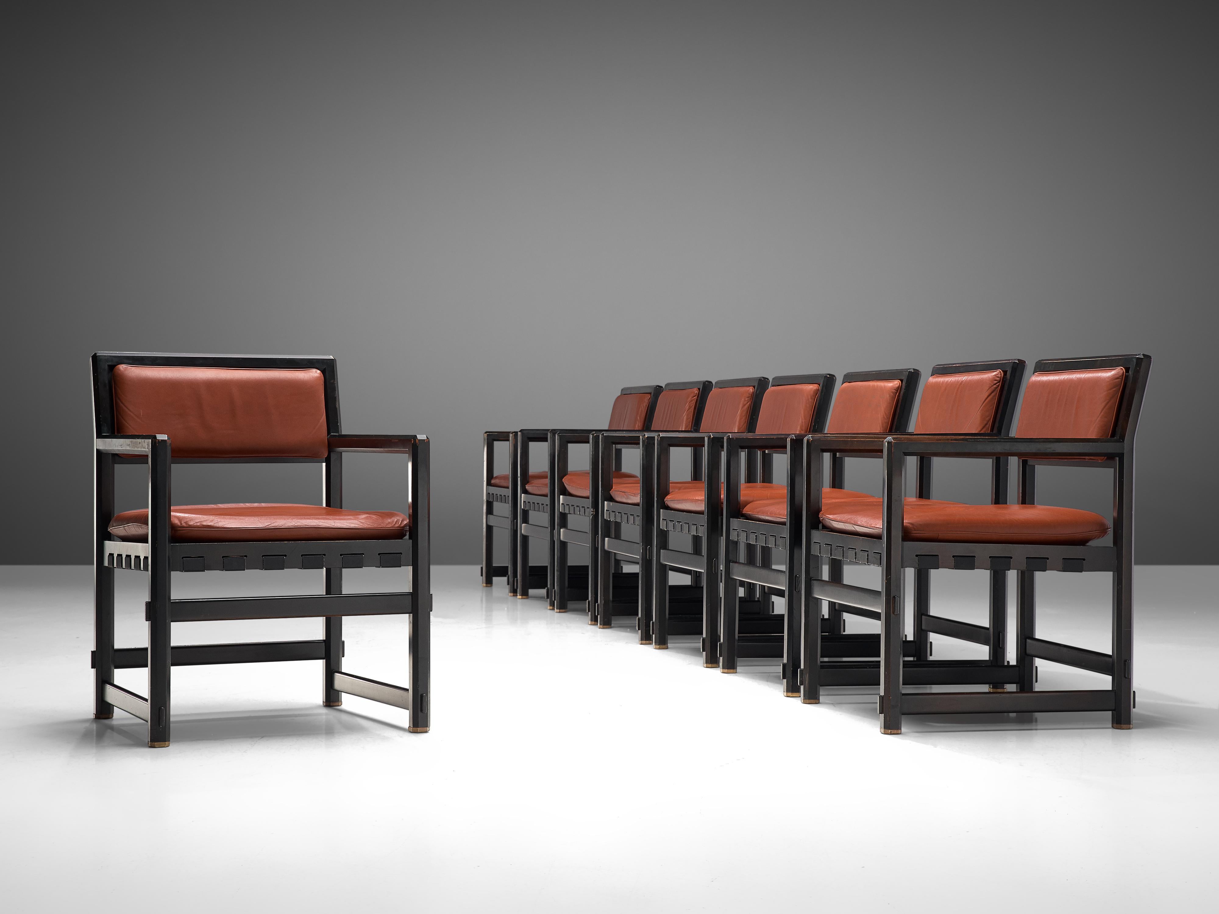 Edward Wormley for Dunbar by Mobilier Universel, set of eight armchairs model 5762, lacquered black wood, red leather, Belgium, design 1957

This set of eight grand armchairs by Edward Wormley designed in 1957 consists of a black lacquered frame and