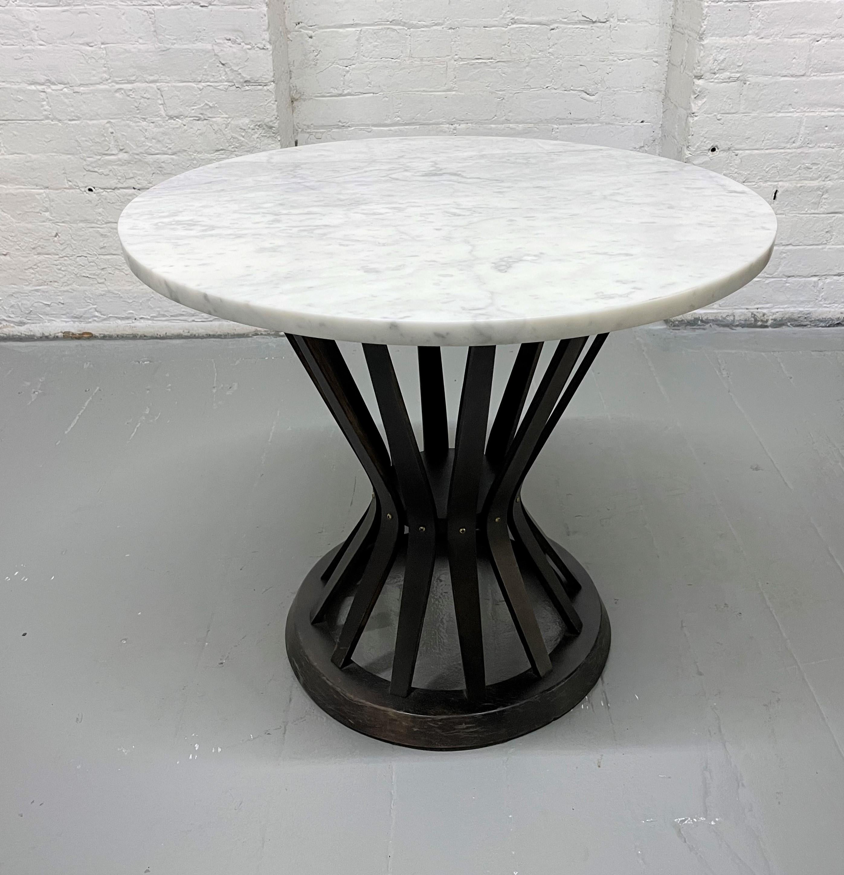 Edward Wormley Style Side Table with a Carrara marble top with a sculptural wood base.