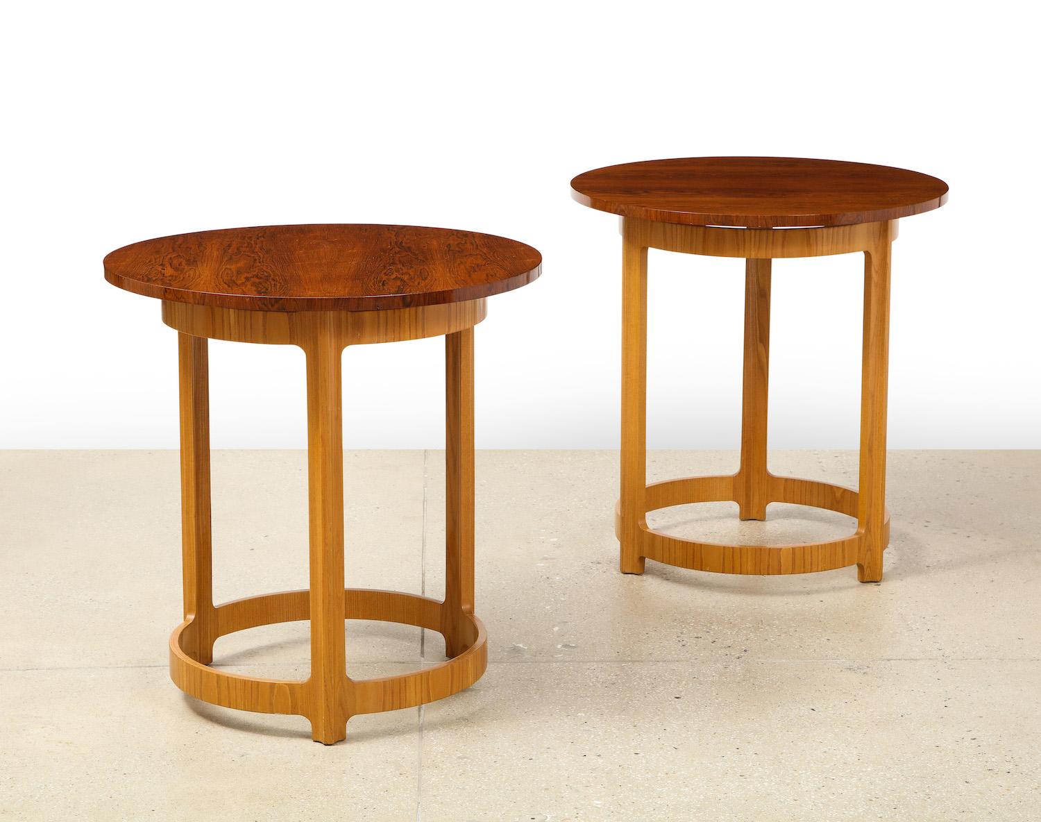 Edward Wormley for Dunbar pair of circular side tables. Tawi walnut tops & ash bases. Great scale and beautiful wood grain throughout. Very good condition. These tables were refinished at some point.