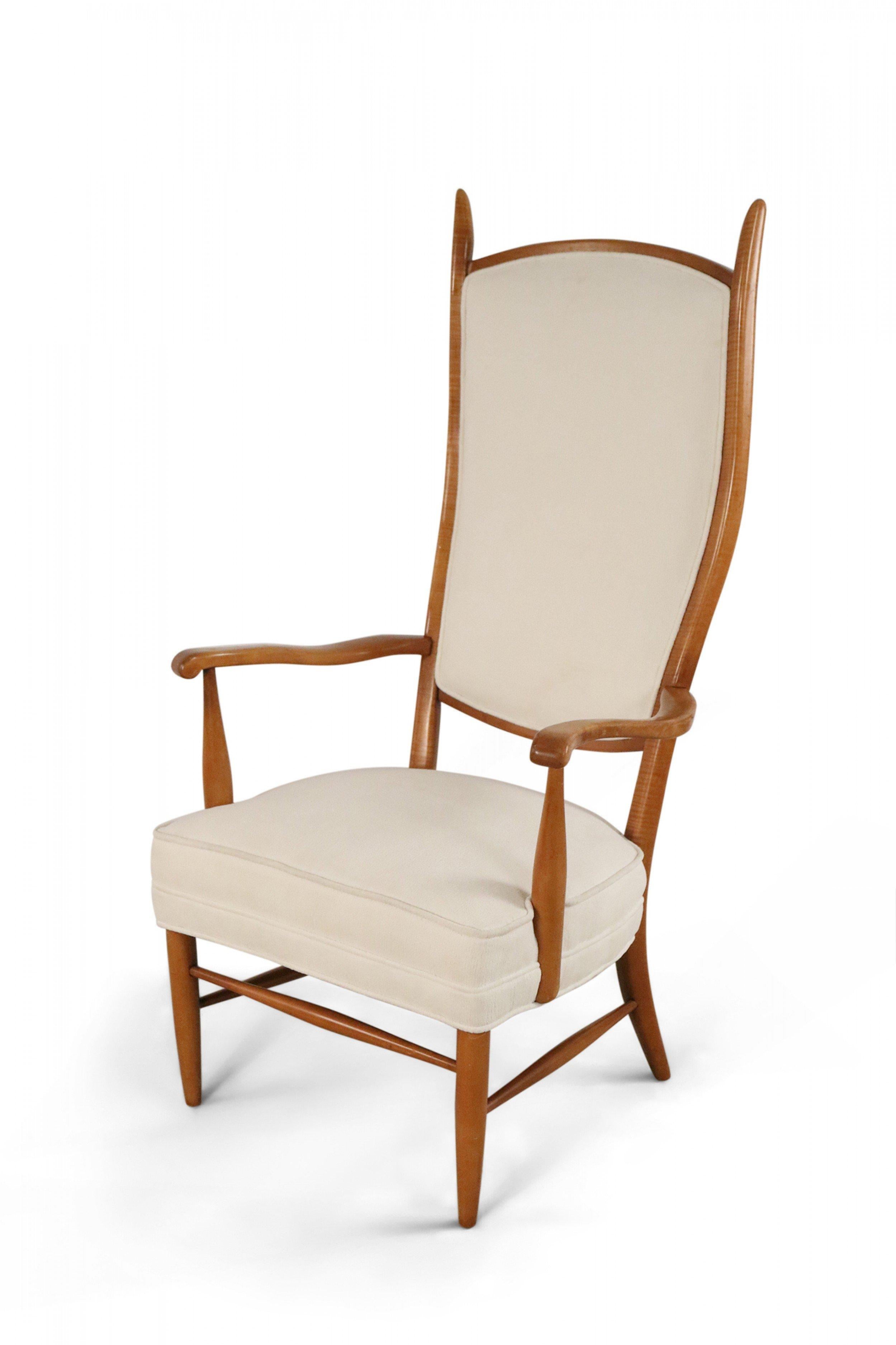 American Mid-Century Modern high back armchair with a maple frame and beige back and seat upholstery. (attributed to EDWARD WORMLEY)