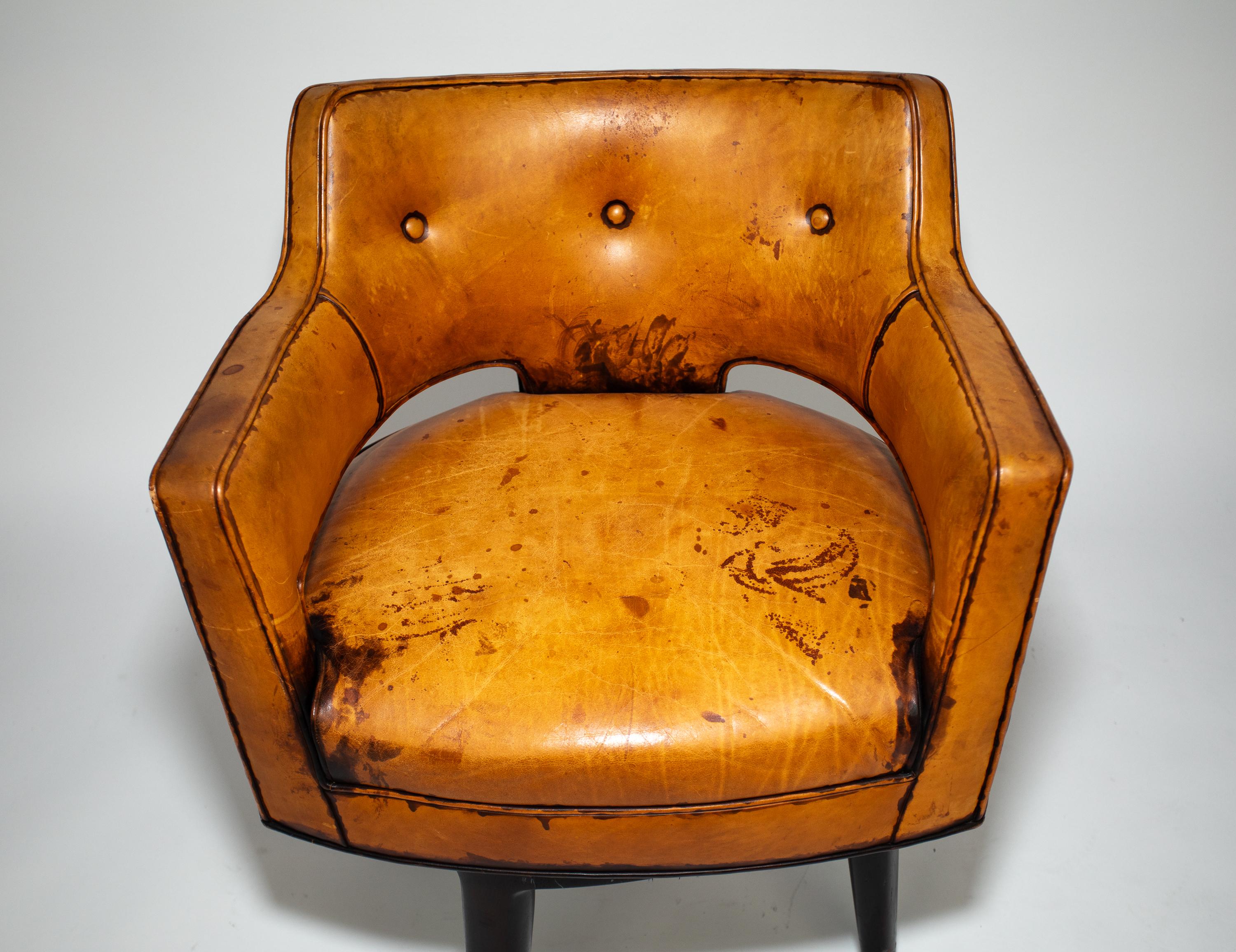 Edward Wormley Patinated Leather Swivel Arm Chair
An early form manufactured by Dunbar