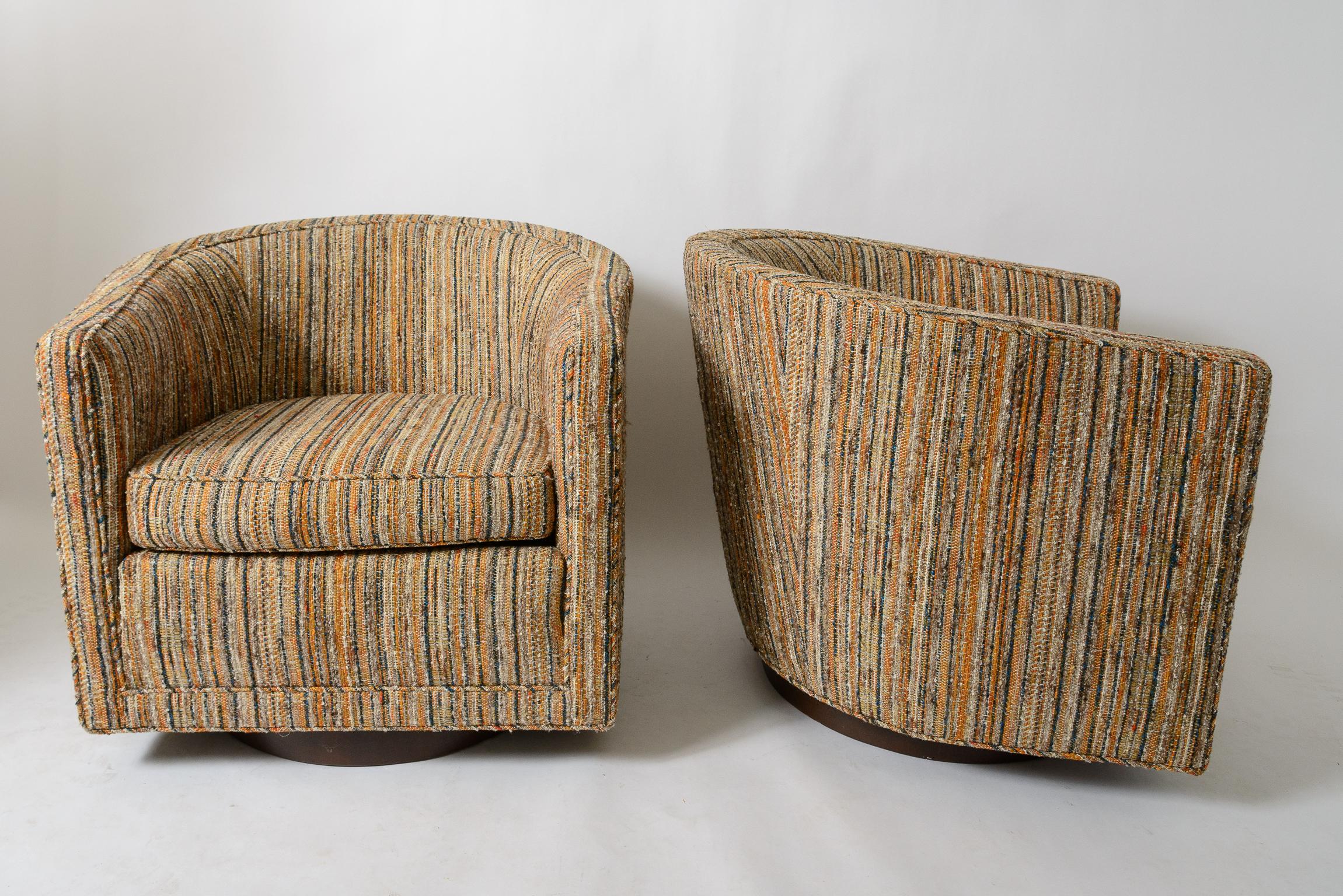 A pair of Edward Wormley Lounge Chairs
Manufactured by Dunbar Furniture
Original Striped Fabric in clean condition
Mahogany laminated base
Marked Dunbar Fabric under seat cushion

