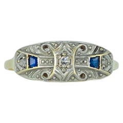 Bague édouardienne en diamants et saphirs bleus d'un poids total de 0,08 carat