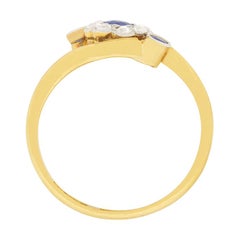 Edwardian 0.15 Carat Sapphire and Diamond Daisy Twist Ring, circa 1900s