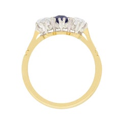 Edwardian 0.30 Carat Sapphire and Diamond Three-Stone Ring, circa 1910s