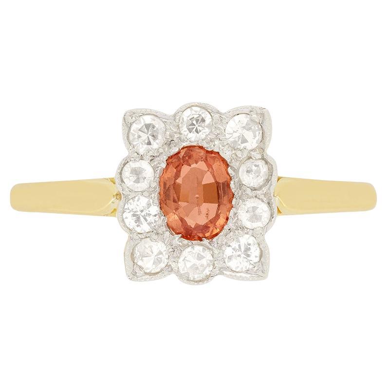 Edwardian 0.40ct Orange Sapphire and Diamond Cluster Ring, c.1910s For Sale
