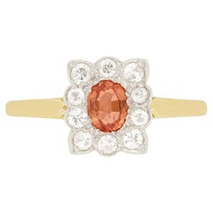 Bague édouardienne en grappe de saphirs orange 0,40 carat et diamants, années 1910