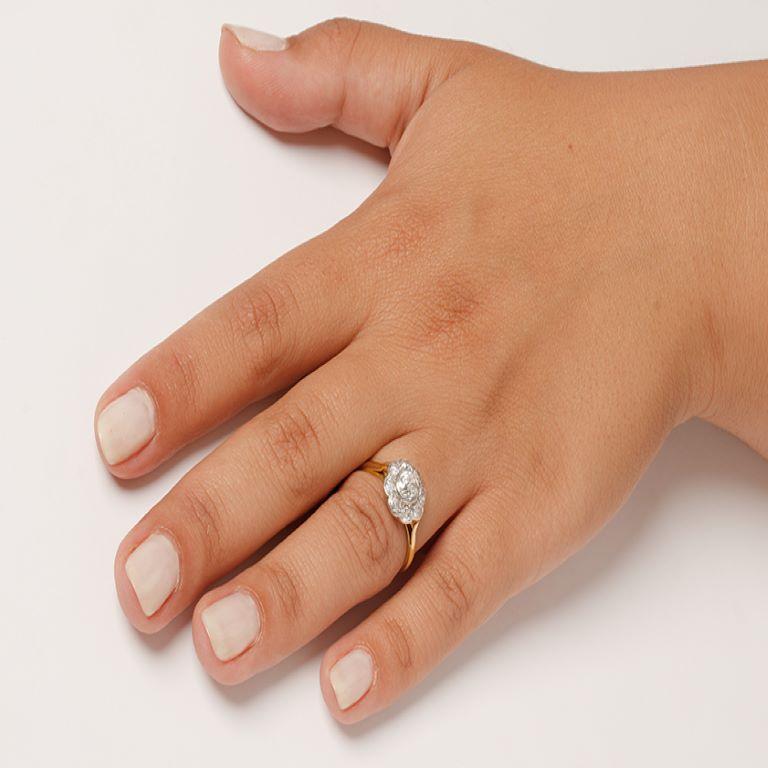 Old Mine Cut Edwardian 0.50 Carat Diamond Daisy Cluster Ring, circa 1910s