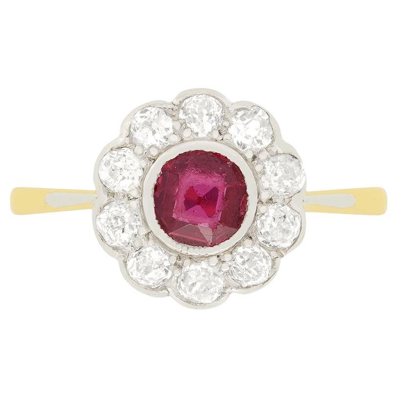 Edwardian 0.50ct Ruby and Diamond Daisy Cluster Ring, circa 1910s For Sale
