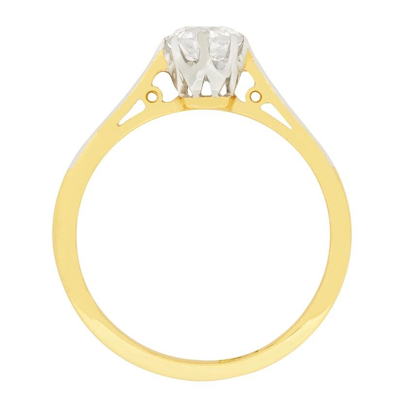 This pretty engagement ring showcases a 0.51 carat old cut diamond. It is a G colour and SI2 clarity, and captures the light beautifully. The diamond is claw set in platinum, which is on the 18 carat yellow gold band. This ring would have been made