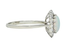 Edwardian 0.60 CTW Opal Diamond Platinum 18 Karat Gold Antique Halo Ring