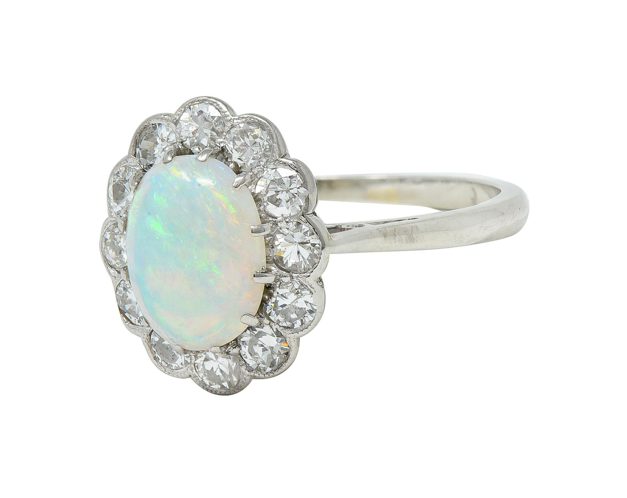 Edwardian 0.60 CTW Opal Diamond Platinum 18 Karat Gold Antique Halo Ring In Excellent Condition For Sale In Philadelphia, PA