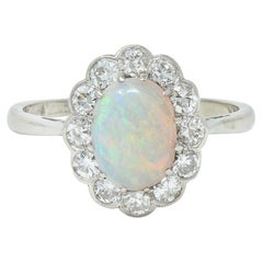Edwardian 0.60 CTW Opal Diamond Platinum 18 Karat Gold Antique Halo Ring