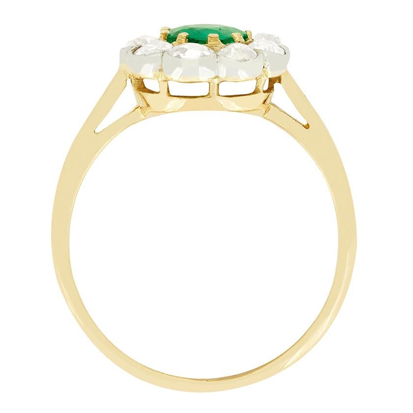 Oval Cut Edwardian 0.60ct Emerald and Diamond Cluster Ring, c.1910s For Sale