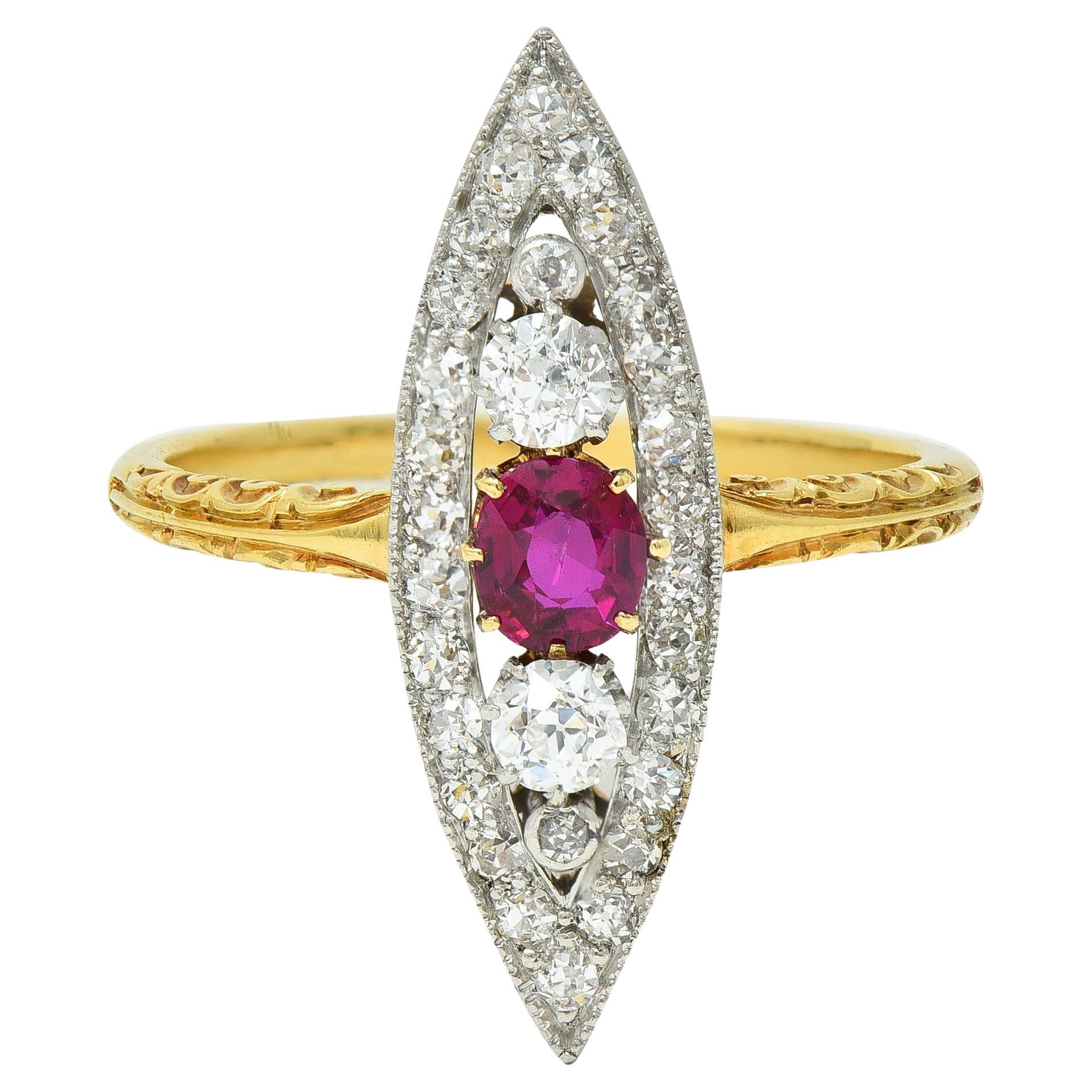 Edwardian 0.62 CTW Ruby Diamond Platinum 18 Karat Gold Scroll Navette Ring For Sale