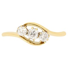 Edwardian 0.65ct Diamond Three Stone Twist Ring, c.1912