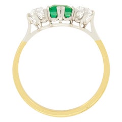 Edwardian 0.65 Carat Emerald and Diamond Three Stone Ring, circa 1910s