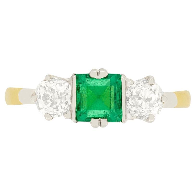 Edwardian 0.65 Carat Emerald and Diamond Three Stone Ring, circa 1910s