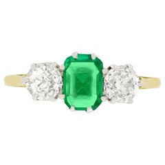 Edwardian 0.70 Carat Emerald and Diamond Three Stone Ring, circa 1910s