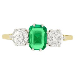 Edwardian 0.70 Carat Emerald and Diamond Three Stone Ring, circa 1910s Edwardian 0.70 Carat Emerald and Diamond Three Stone Ring, circa 1910s