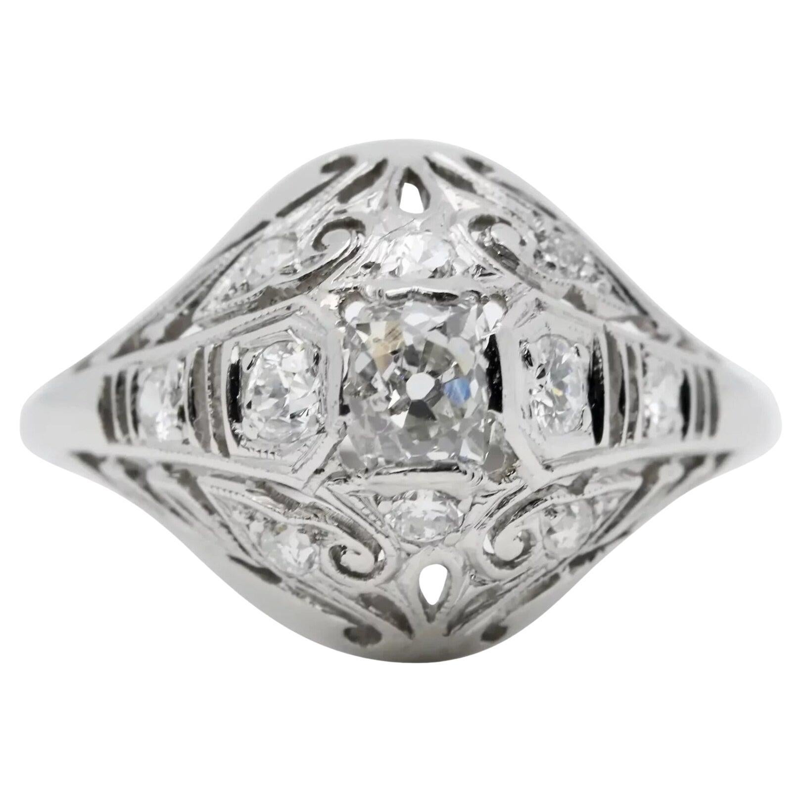 Edwardian 0.71ct Old Mine Cut Diamond Filigree Engagement Ring in Platinum For Sale