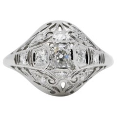 Edwardian 0.71ct Old Mine Cut Diamond Filigree Engagement Ring in Platinum
