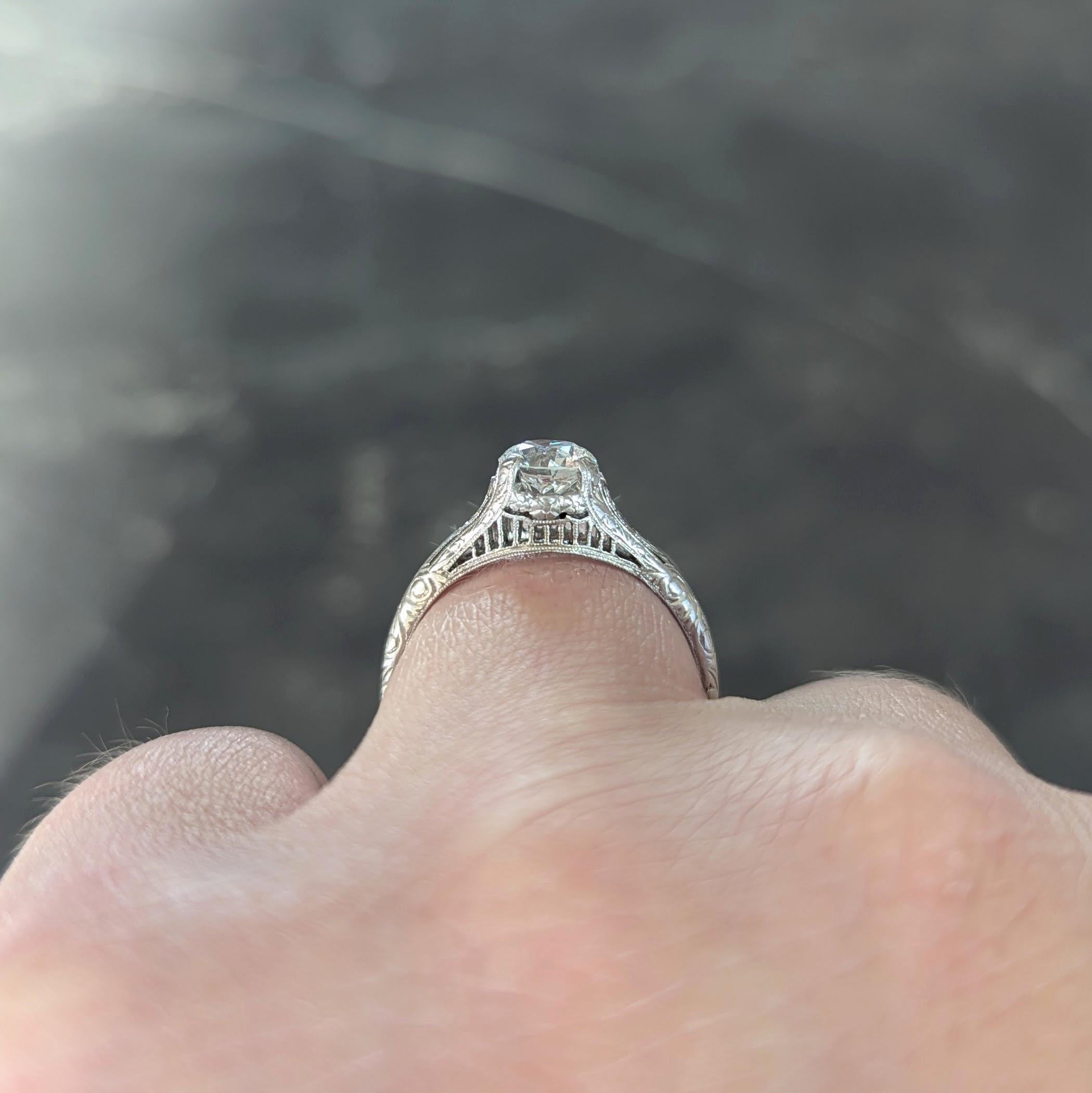 Edwardian 0.72 CTW OEC Diamond Platinum Antique Scroll Solitaire Engagement Ring For Sale 7