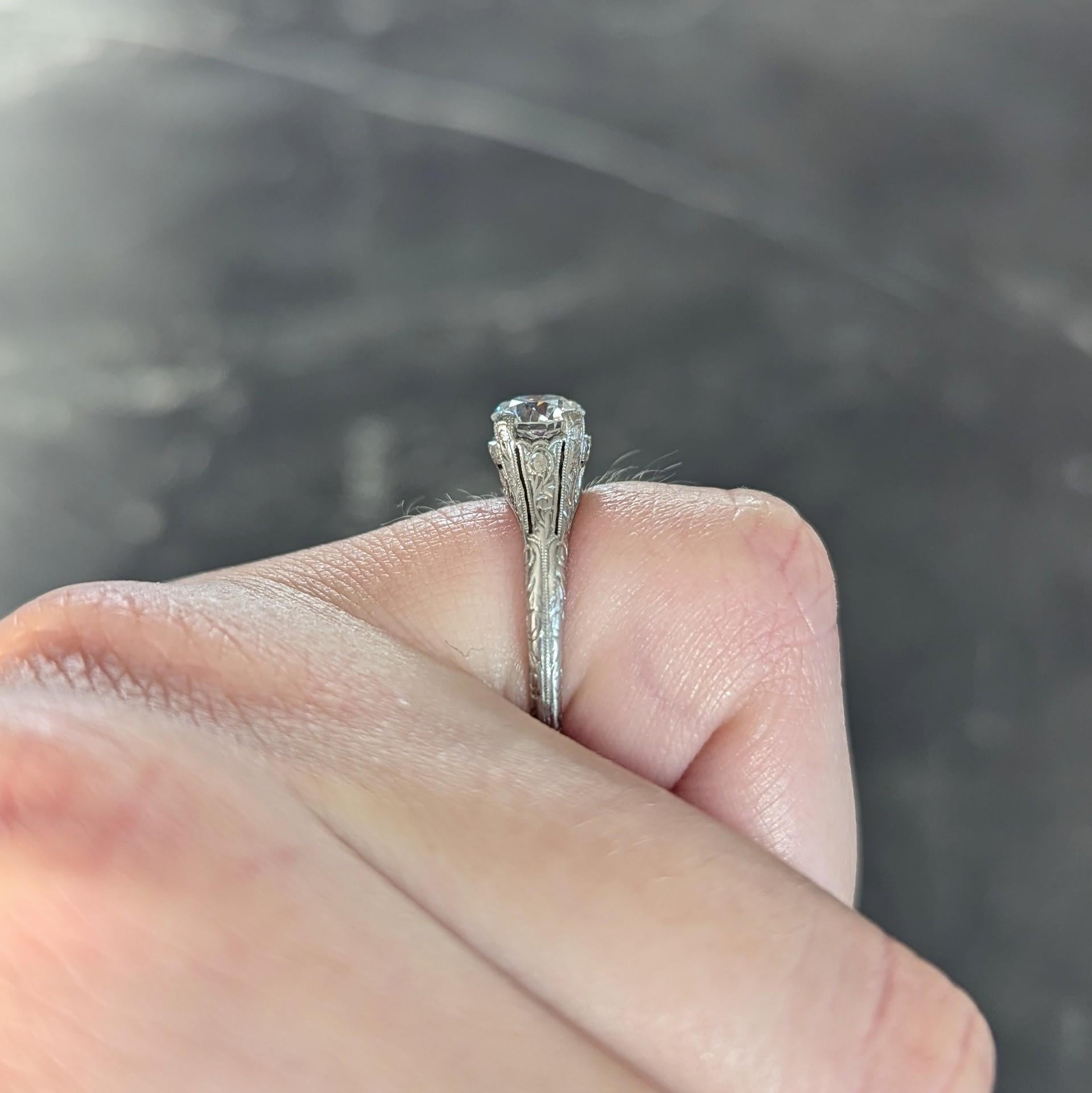 Edwardian 0.72 CTW OEC Diamond Platinum Antique Scroll Solitaire Engagement Ring For Sale 8