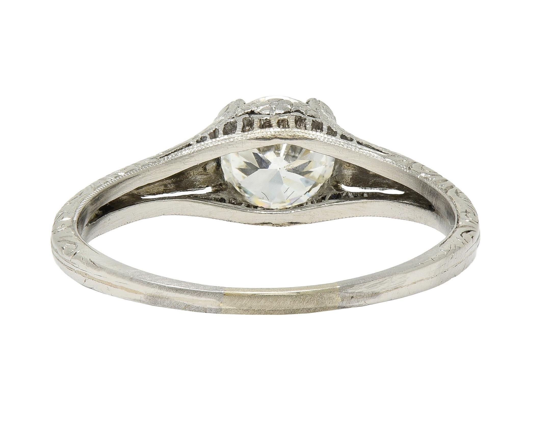 Edwardian 0.72 CTW OEC Diamond Platinum Antique Scroll Solitaire Engagement Ring For Sale 1