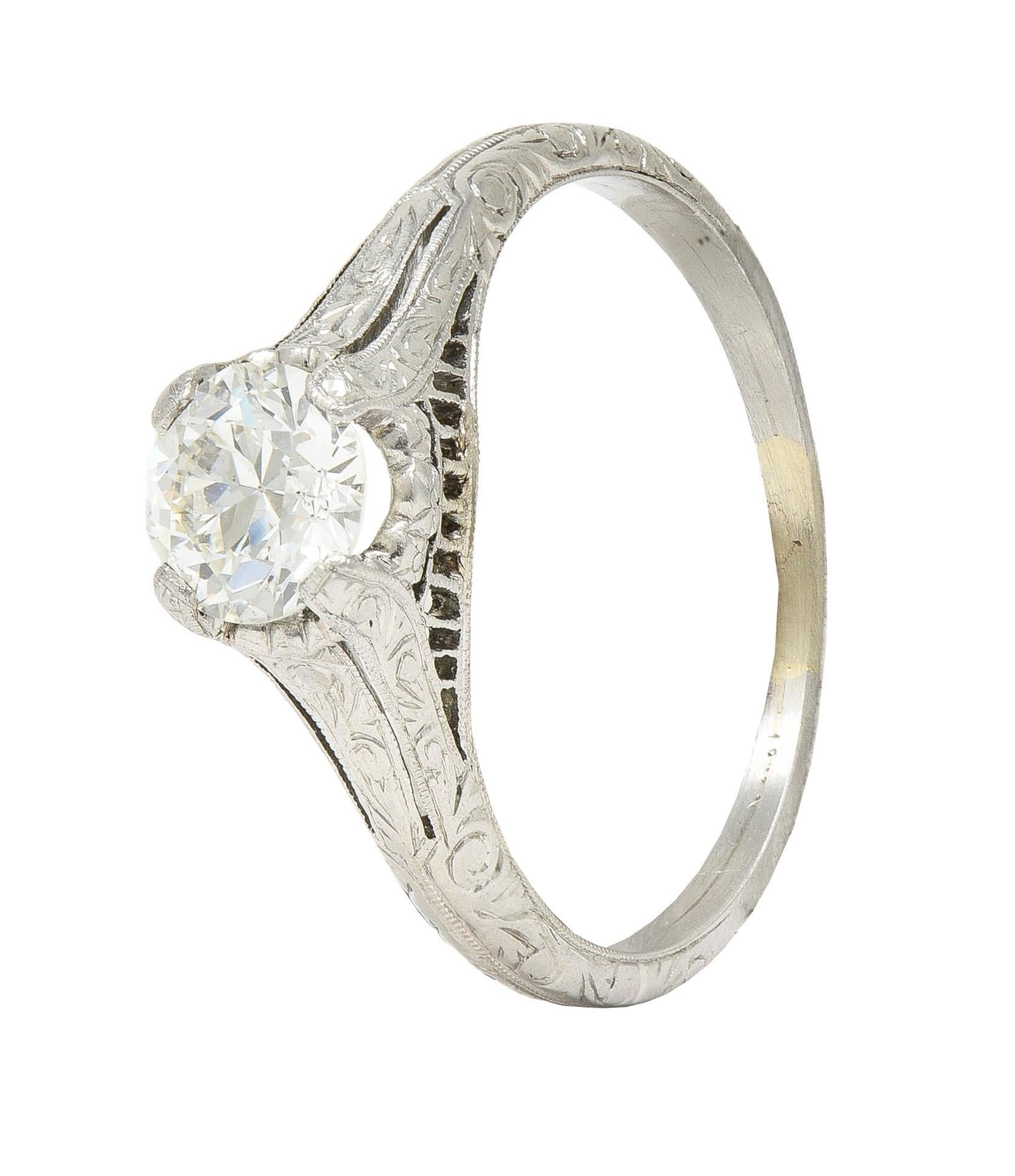 Edwardian 0.72 CTW OEC Diamond Platinum Antique Scroll Solitaire Engagement Ring For Sale 4