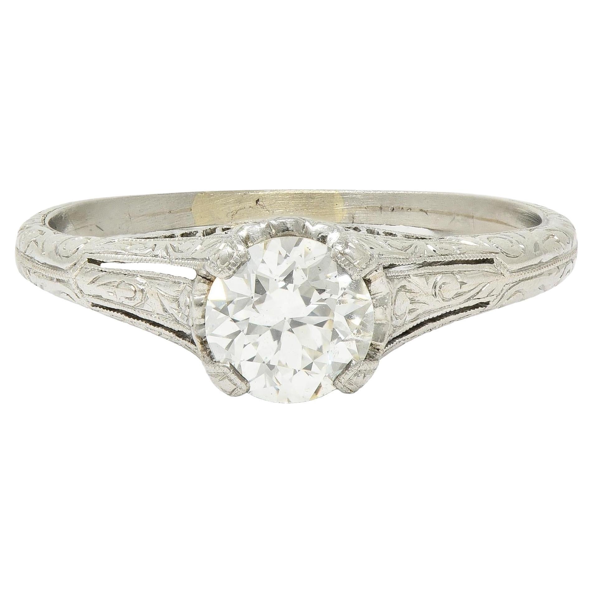 Edwardian 0.72 CTW OEC Diamond Platinum Antique Scroll Solitaire Engagement Ring For Sale
