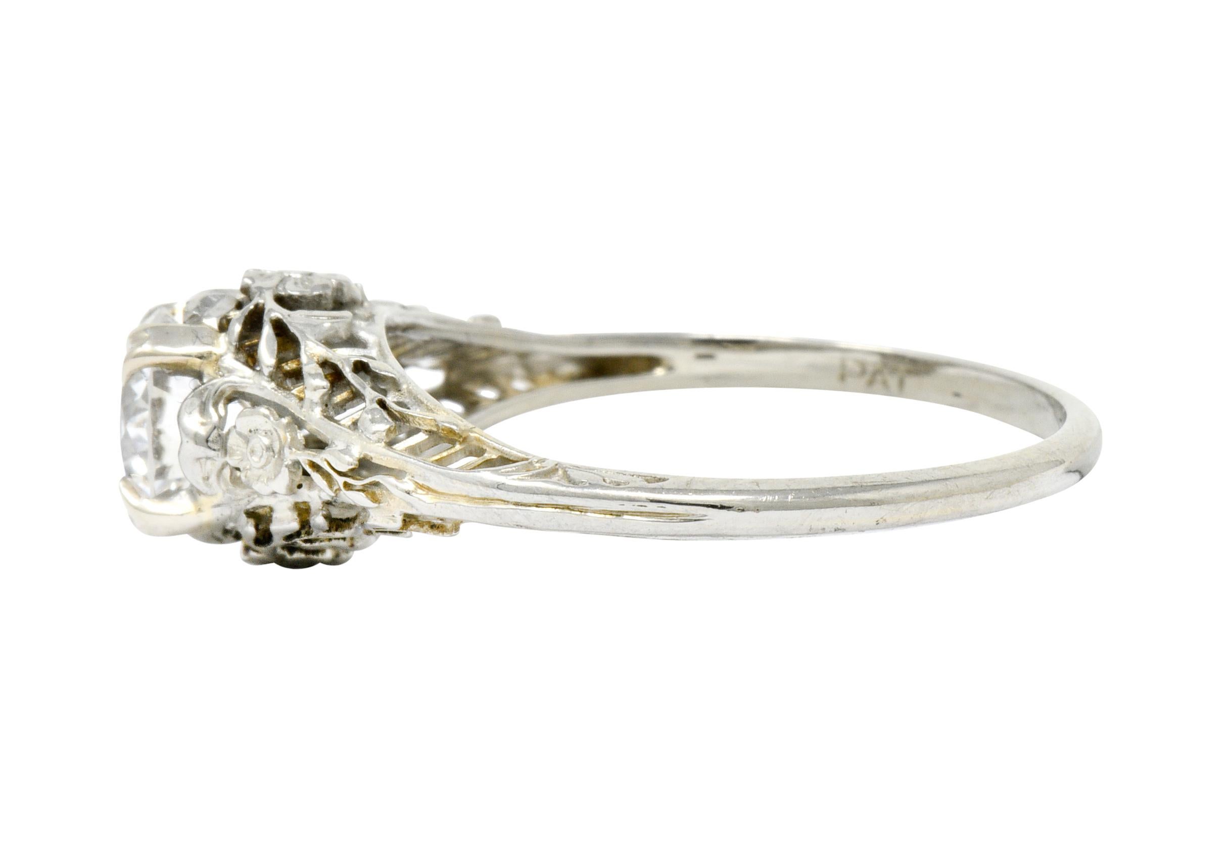 Women's or Men's Edwardian 0.73 Carat Diamond 18 Karat White Gold Floral Engagement Ring GIA