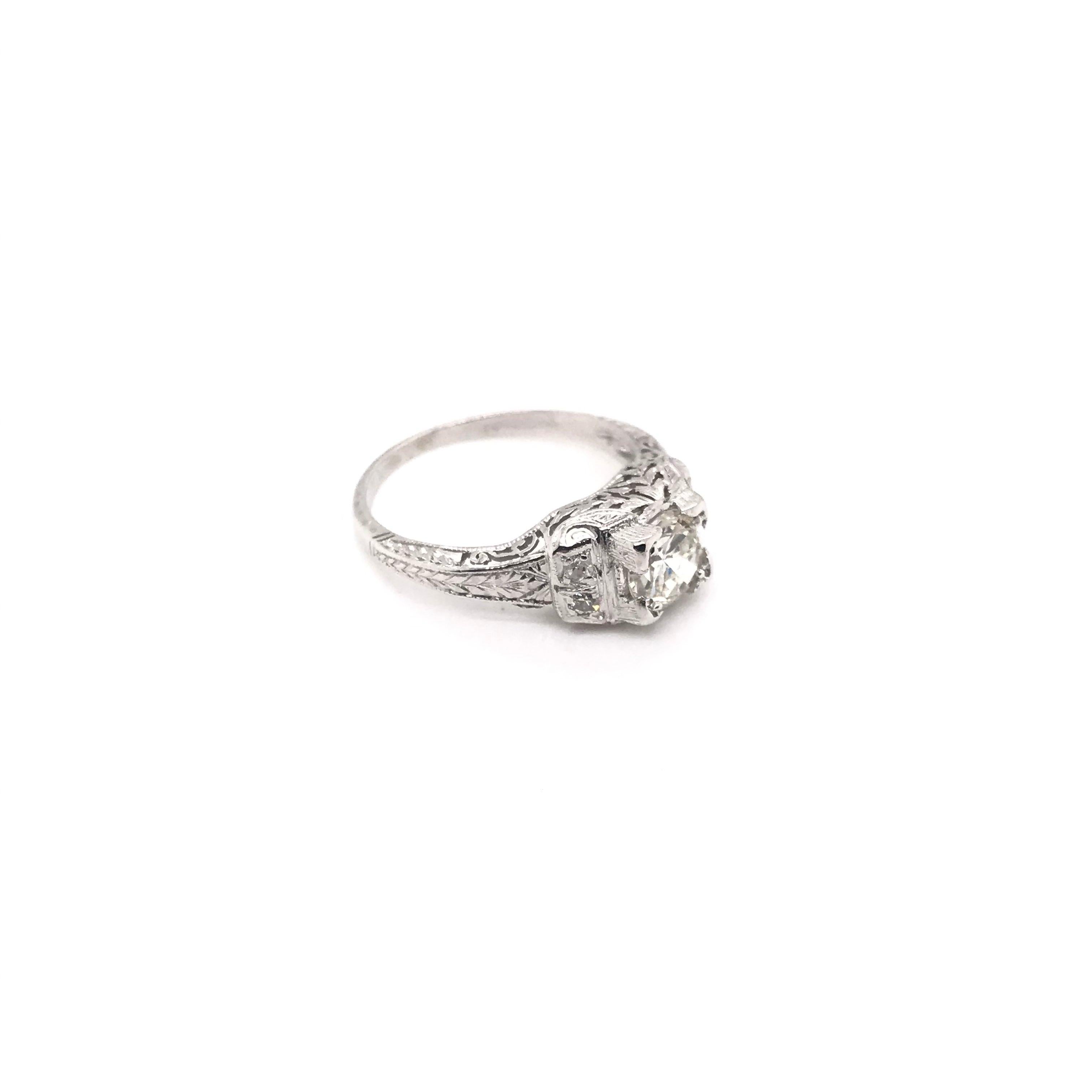 Women's Edwardian 0.74 Carat Diamond and Platinum Filigree Ring For Sale