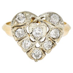 Edwardian 0.74 CTW Diamond Platinum-Topped 14 Karat Gold Antique Heart Ring