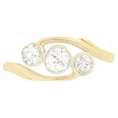 Edwardian 0.75ct Diamond Three Stone Twist Ring, c.1910s