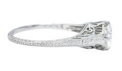Edwardian 0.77 Carat Diamond Platinum Scrolled Foliate Engagement Ring