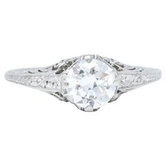 Edwardian 0.77 Carat Diamond Platinum Scrolled Foliate Engagement Ring