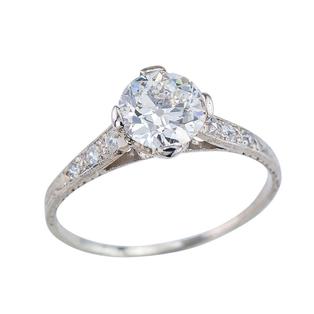 GIA report certified 0.87 carat H color SI2 clarity old European-cut diamond Edwardian platinum engagement ring size 6 circa 1910.  Additionally, the ring is set with six single cut diamonds totaling approximately 0.14 carat, approximately H - I