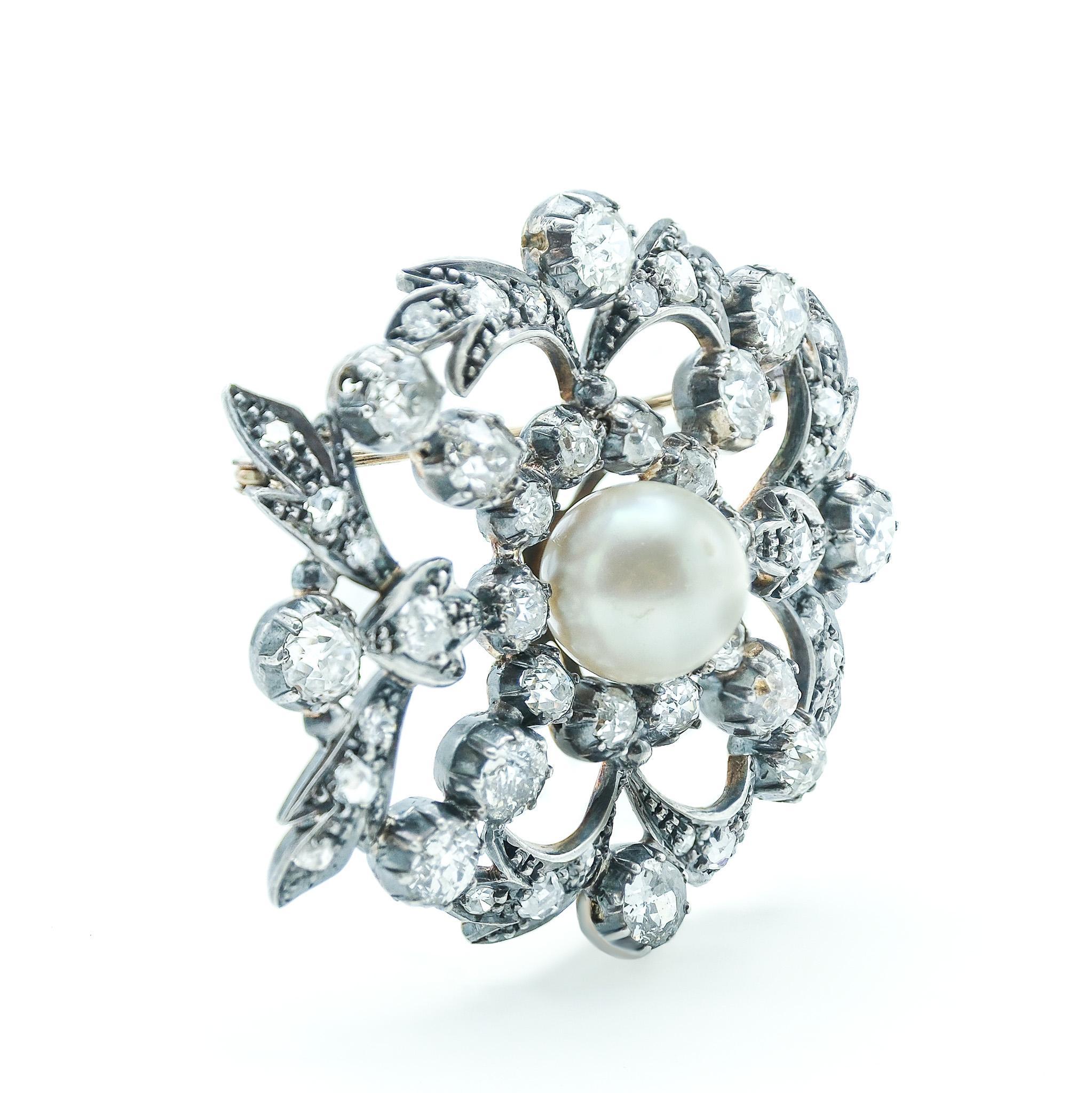 Edwardian 10 Karat White Gold, Silver Topped Diamond and Pearl Brooch In Good Condition For Sale In Fairfield, CT