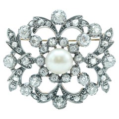 Antique Edwardian 10 Karat White Gold, Silver Topped Diamond and Pearl Brooch