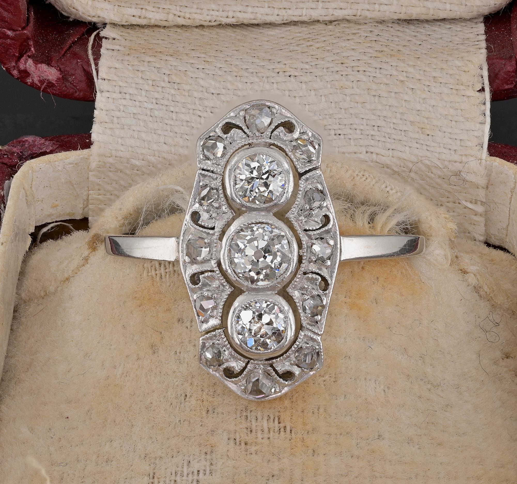 Edwardian Sensual and sinuous ballerina design ring, Platinum hand crafted as unique, 1900 ca
Fine openwork with a timeless Edwardian design, set with vertical trio of Diamonds encircled in a target and bordered with major sparkle of rose cut