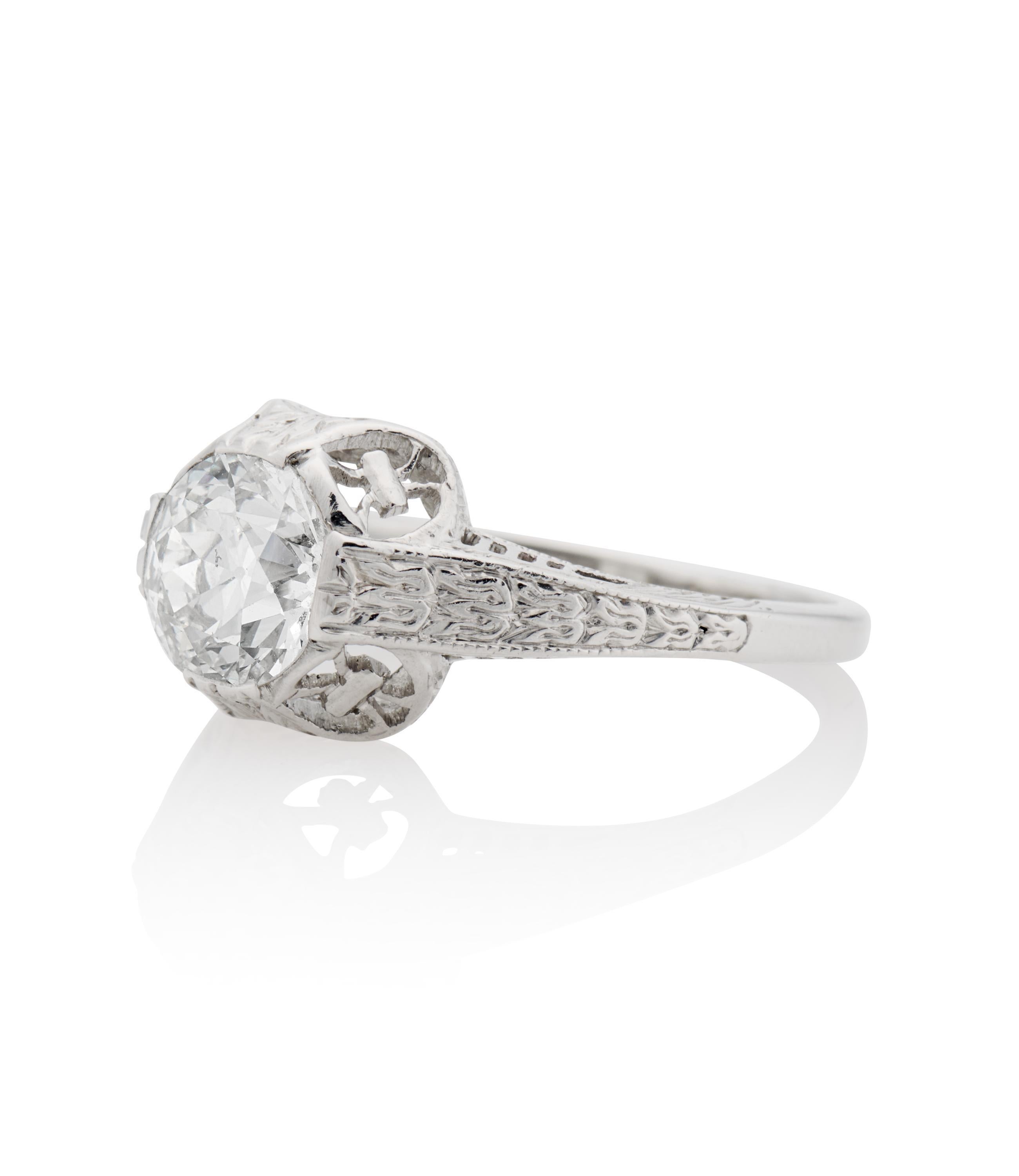 Description 
Antique Edwardian Hand Engraved engagement ring centered with a 1.01 carat Old European Cut diamond with an intricate filigree design Platinum setting. A unique design from the Edwardian era.
SKU #R938
Platinum
Measurements: 8.57mm