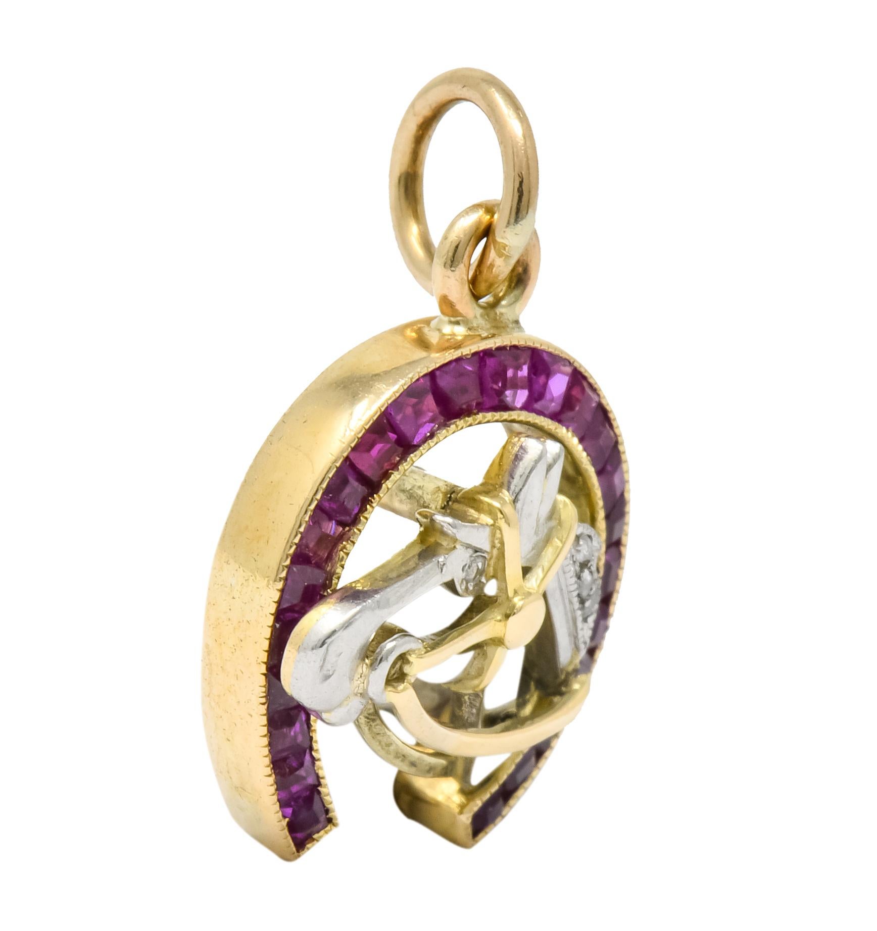 Featuring an 18 karat gold horseshoe with an applied platinum profile of a horse 

Horseshoe contains 1.0 carat total of calibré cut rubies, deep raspberry red and very well matched 

Platinum profile of horse contains 0.03 carat total of bead set