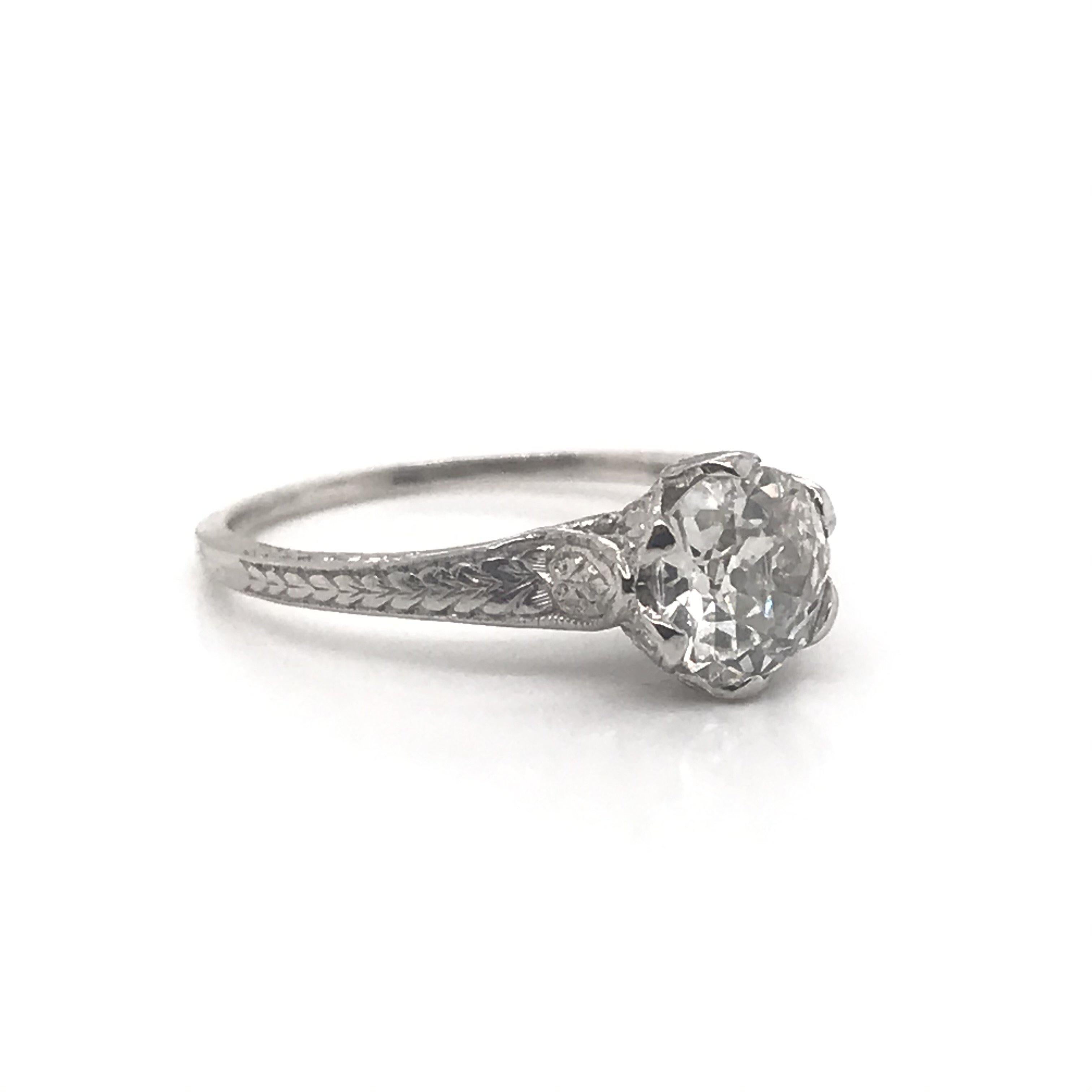 We just love this lovely antique solitaire setting!

Dating back to 1910 - 1920, this beautiful ring features a stunning 1.04 Carat Old Mine Cut Diamond, J Color, Si2 Clarity. The wheat style engraving goes down from the top of the head to half way