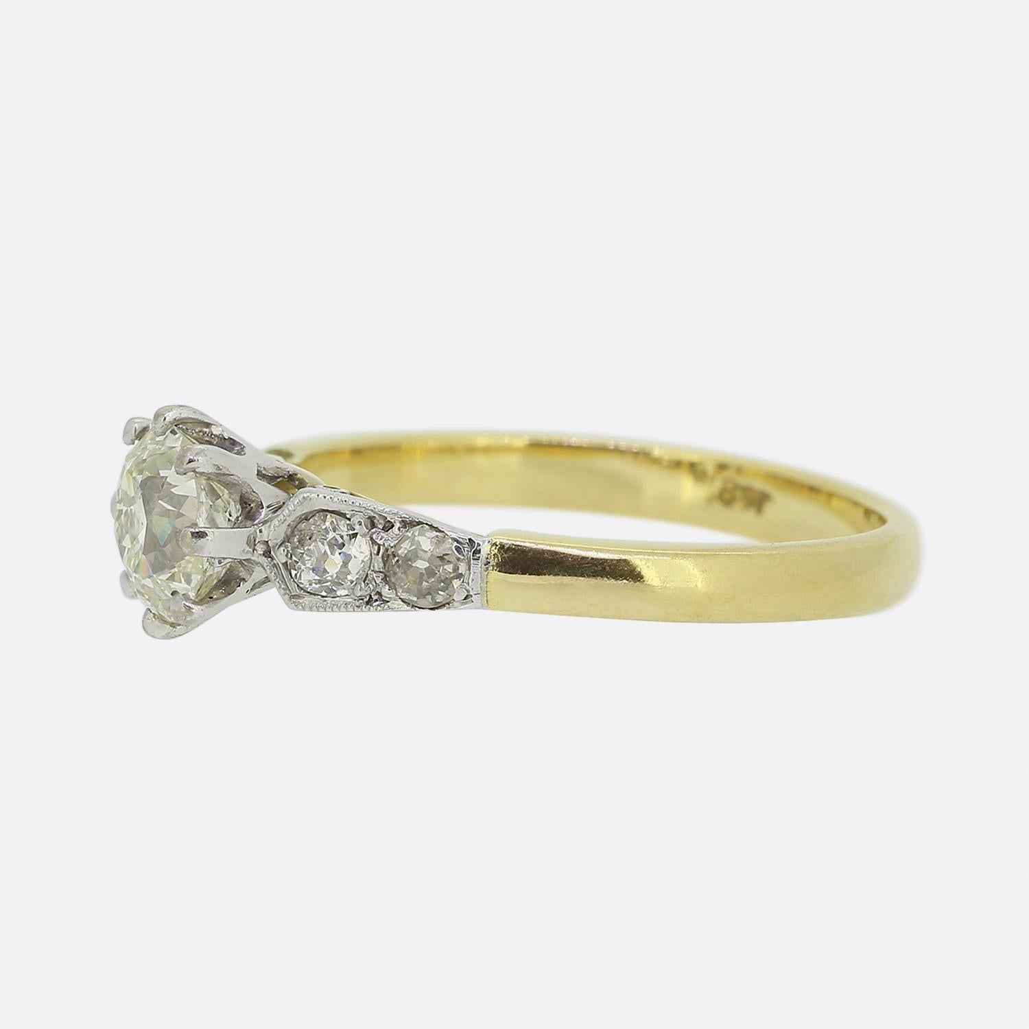 This is an 18ct yellow gold Edwardian diamond solitaire ring. The 1.05 carat old mine cut diamond sits in a raised 8 claw mount and has a lovely bright sparkle and plenty of character. Although the band of the ring is 18ct yellow gold the diamonds