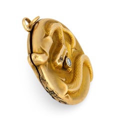 Ciondolo a forma di serpente con diamante e granato Repousse di epoca edoardiana (10k)