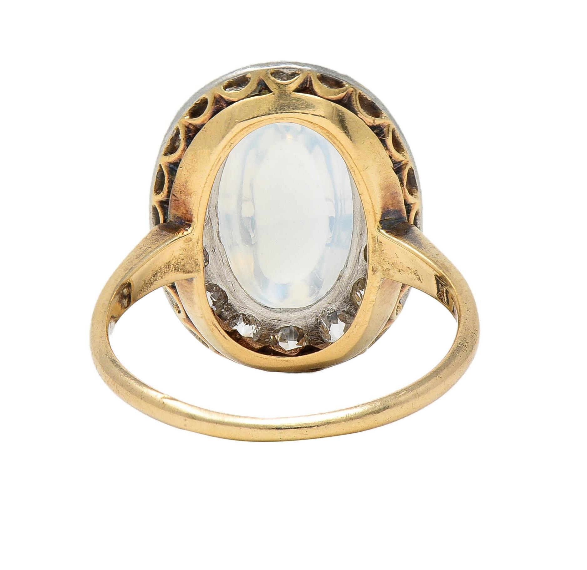 Women's or Men's Edwardian 1.12 CTW Moonstone Diamond Platinum 14 Karat Gold Antique Halo Ring For Sale