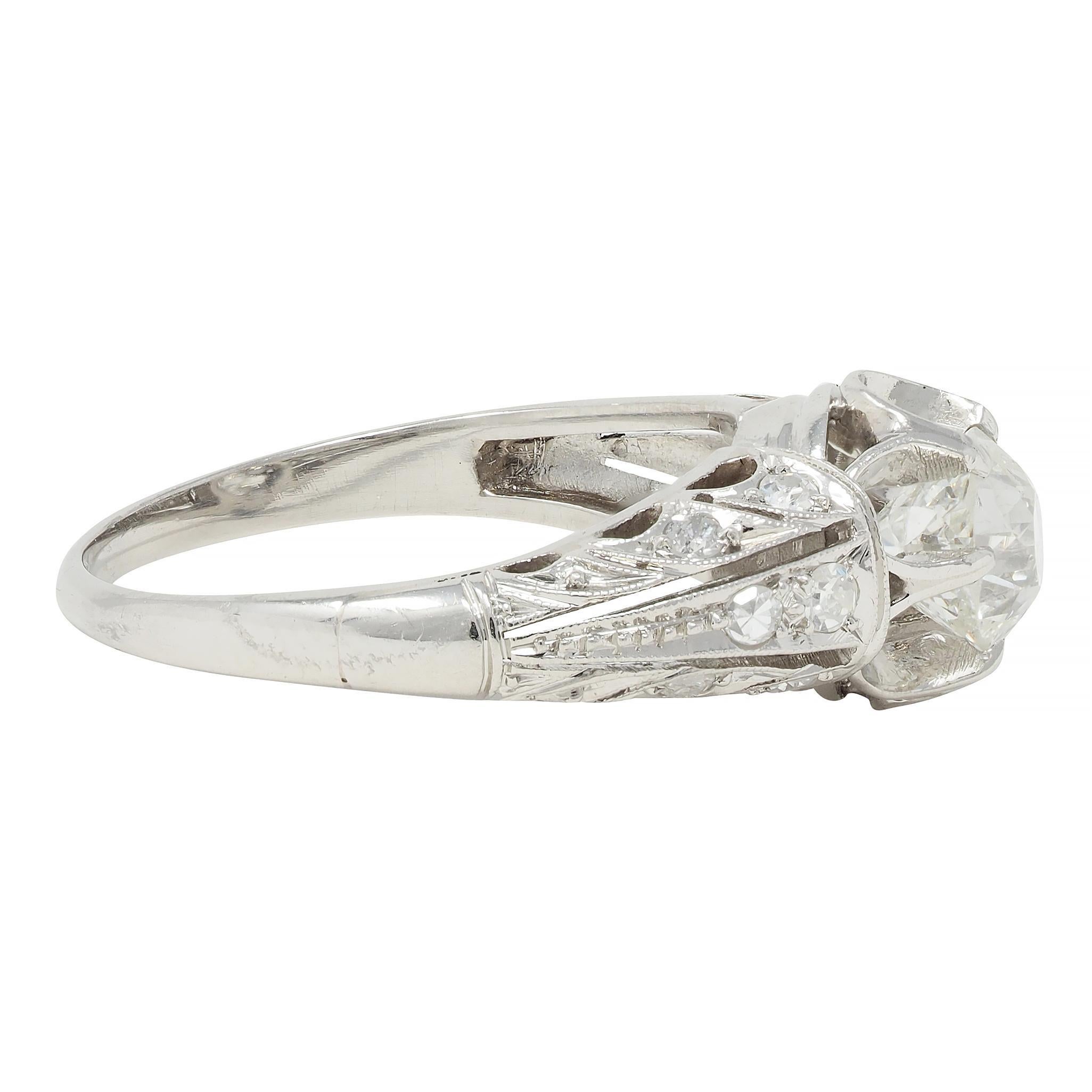 Edwardian 1.16 CTW Old Mine Cut Diamond Platinum Buttercup Engagement Ring In Excellent Condition For Sale In Philadelphia, PA
