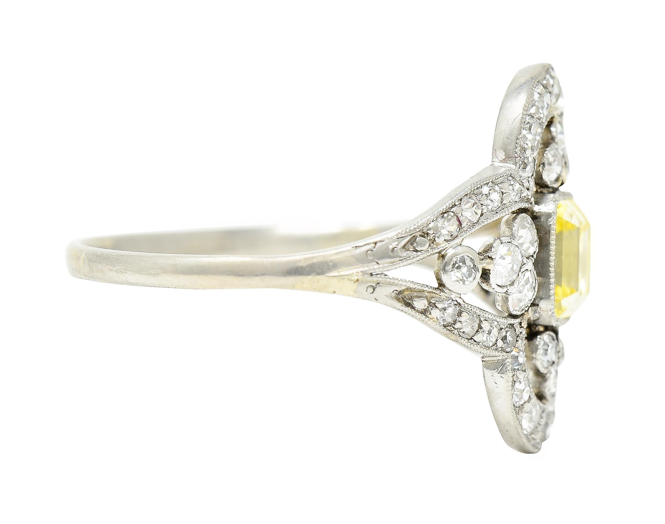 Edwardian 1.17 Carat Emerald Cut Fancy Yellow Diamond Platinum Quatrefoil Ring In Excellent Condition In Philadelphia, PA